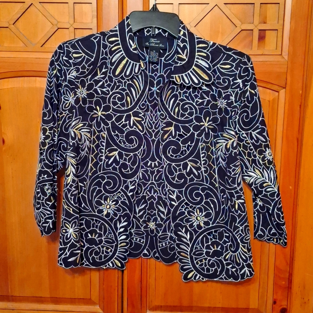 An adorable scalloped jacket looks great with black dress or pants. Worn once